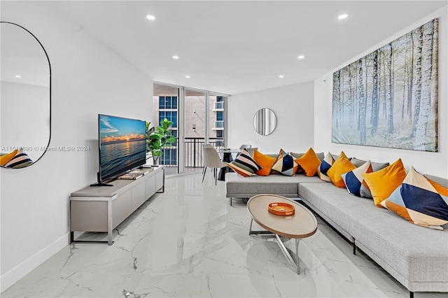 tiled living room with floor to ceiling windows