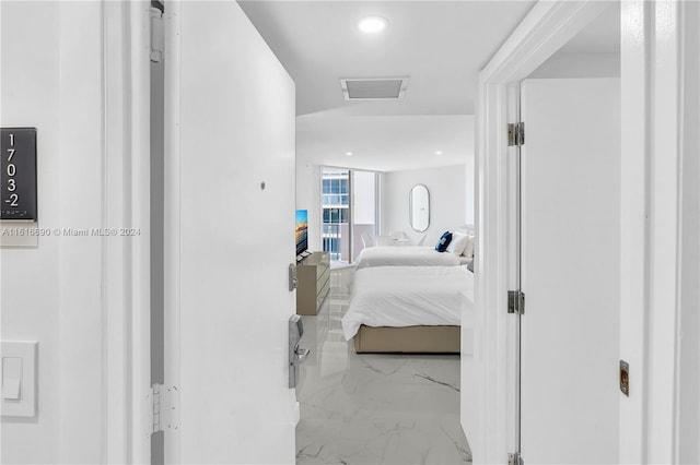 bedroom with tile patterned floors