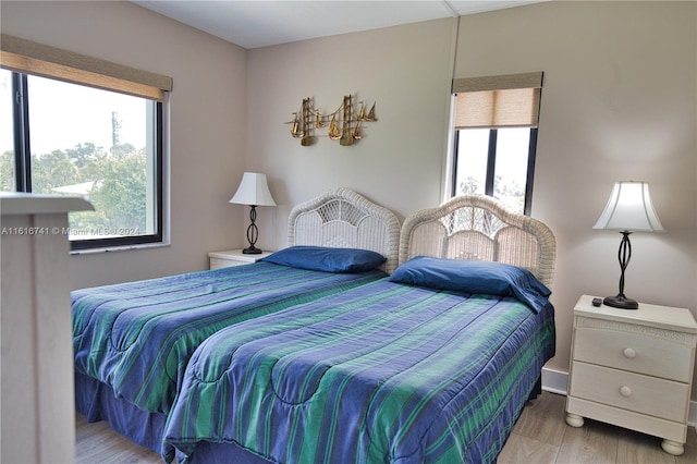 bedroom with light hardwood / wood-style flooring