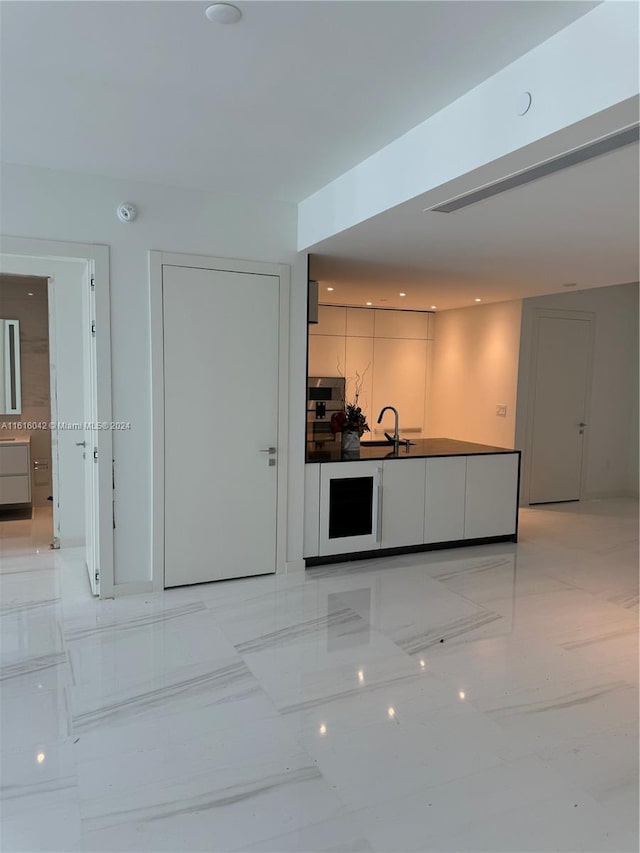 kitchen with light tile patterned floors