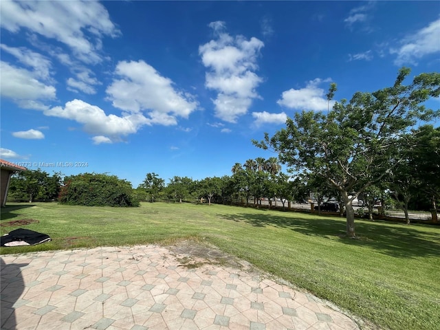 31002 SW 212th Ave, Homestead, FL 33030 - view of grassy yard featuring a patio