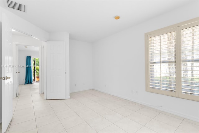 view of tiled spare room