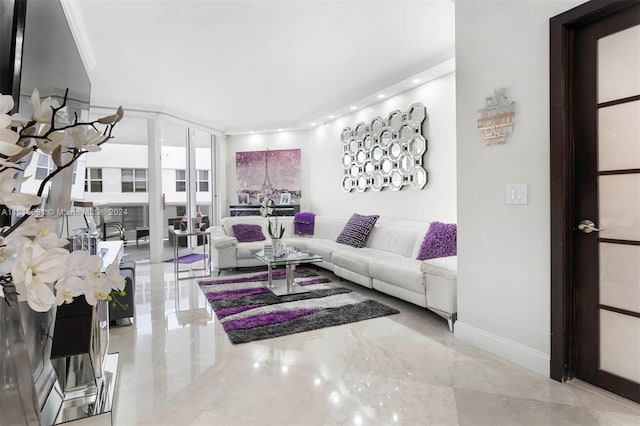 living room featuring expansive windows and ornamental molding