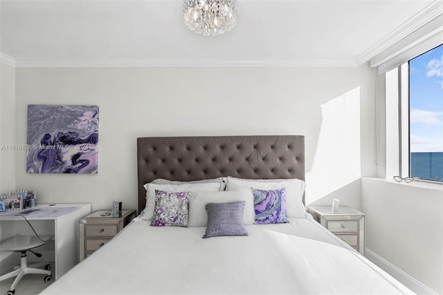 bedroom with a chandelier and crown molding