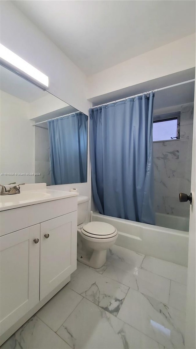 full bathroom with shower / tub combo, vanity, and toilet