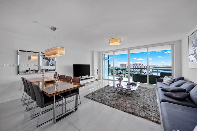 living room featuring floor to ceiling windows