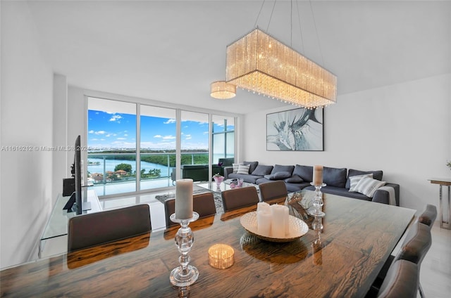 dining space featuring expansive windows