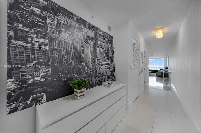 hallway featuring light tile patterned flooring