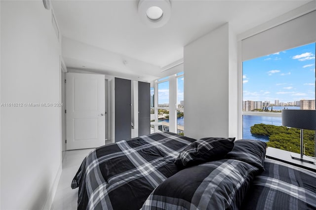 bedroom with a water view