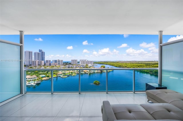 balcony featuring a water view