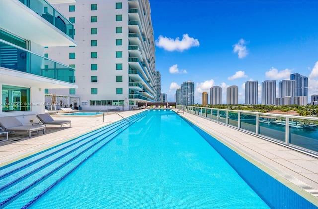 view of pool featuring a patio