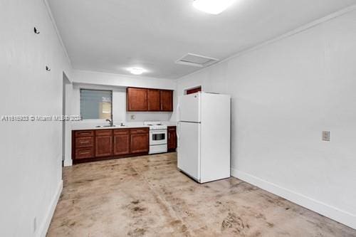 kitchen featuring sink and white appliances