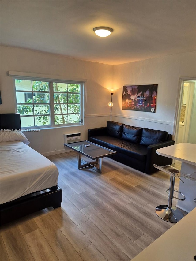 bedroom featuring hardwood / wood-style floors