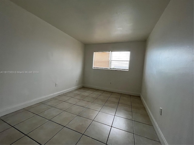 view of tiled empty room