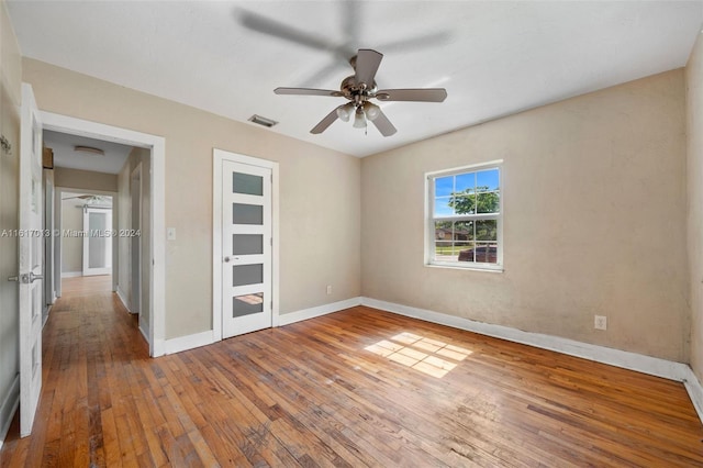 1400 SW 62nd Ave, West Miami, FL 33144 - unfurnished room featuring wood-type flooring and ceiling fan