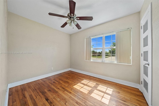 1400 SW 62nd Ave, West Miami, FL 33144 - empty room with hardwood / wood-style flooring and ceiling fan