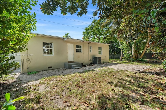 1400 SW 62nd Ave, West Miami, FL 33144 - back of property with a patio and stucco siding
