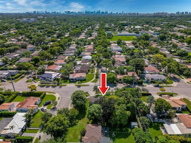 1400 SW 62nd Ave, West Miami, FL 33144 - aerial perspective of suburban area with city skyline