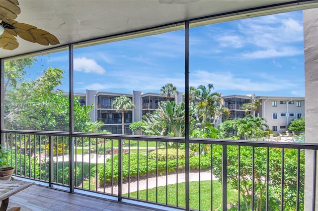 unfurnished sunroom featuring a wealth of natural light