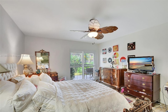 bedroom featuring ceiling fan and access to outside