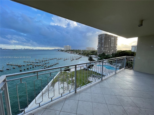 balcony at dusk with a water view