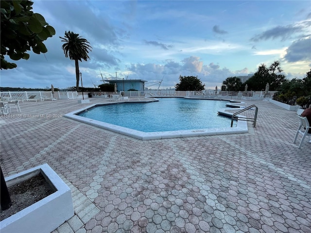 view of pool featuring a patio area