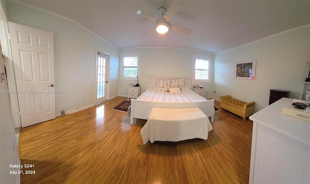 bedroom with hardwood / wood-style flooring and ornamental molding