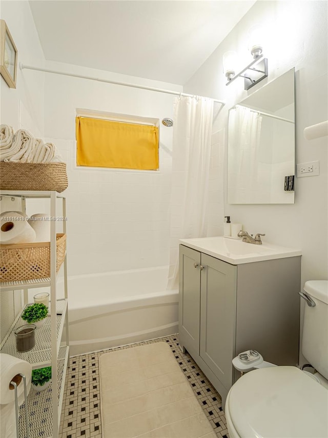 full bathroom featuring vanity, toilet, tile patterned flooring, and shower / bath combination with curtain