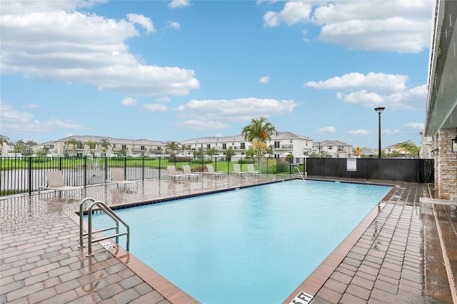 view of pool featuring a patio area