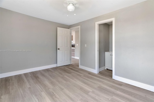 unfurnished bedroom with light hardwood / wood-style floors