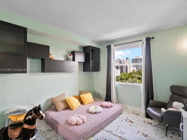 bedroom with a textured ceiling