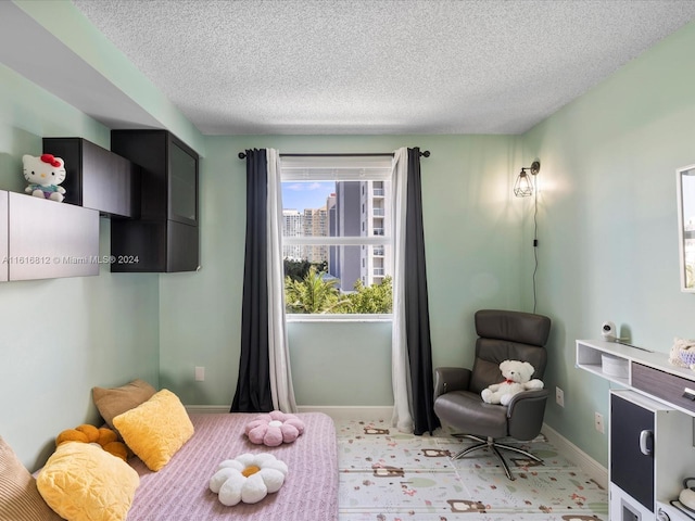 bedroom featuring a textured ceiling