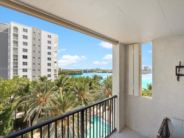 balcony featuring a water view