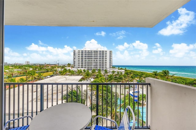 balcony featuring a water view