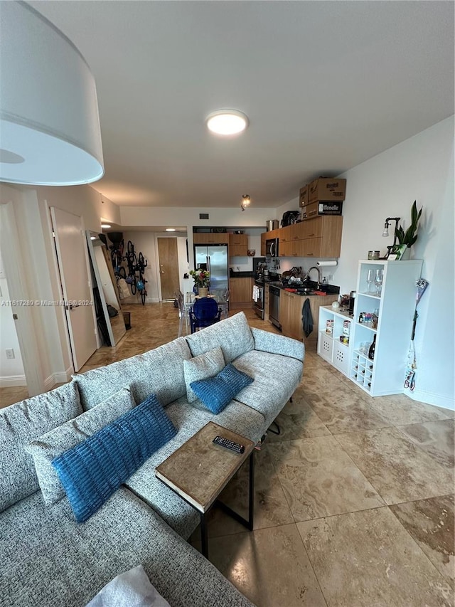 tiled living room with sink