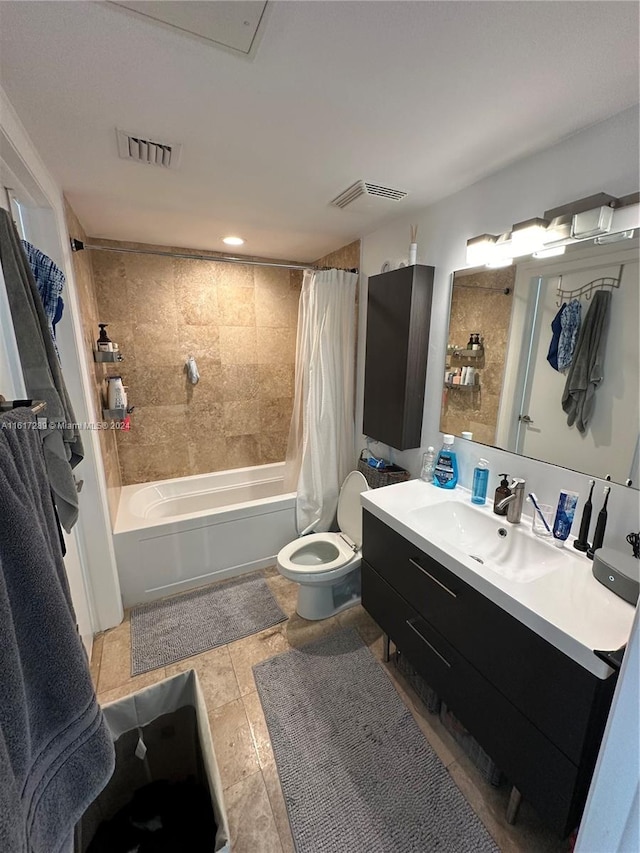 full bathroom featuring vanity, toilet, shower / bathtub combination with curtain, and tile patterned floors