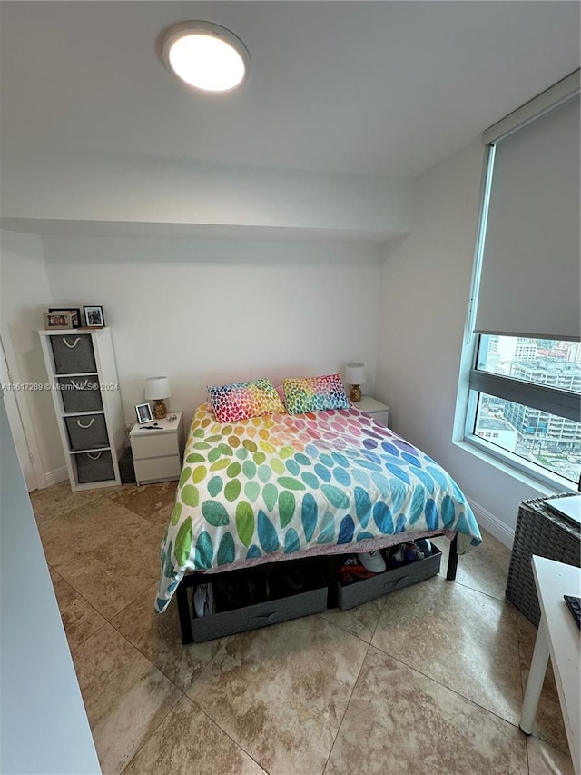 bedroom with tile patterned floors