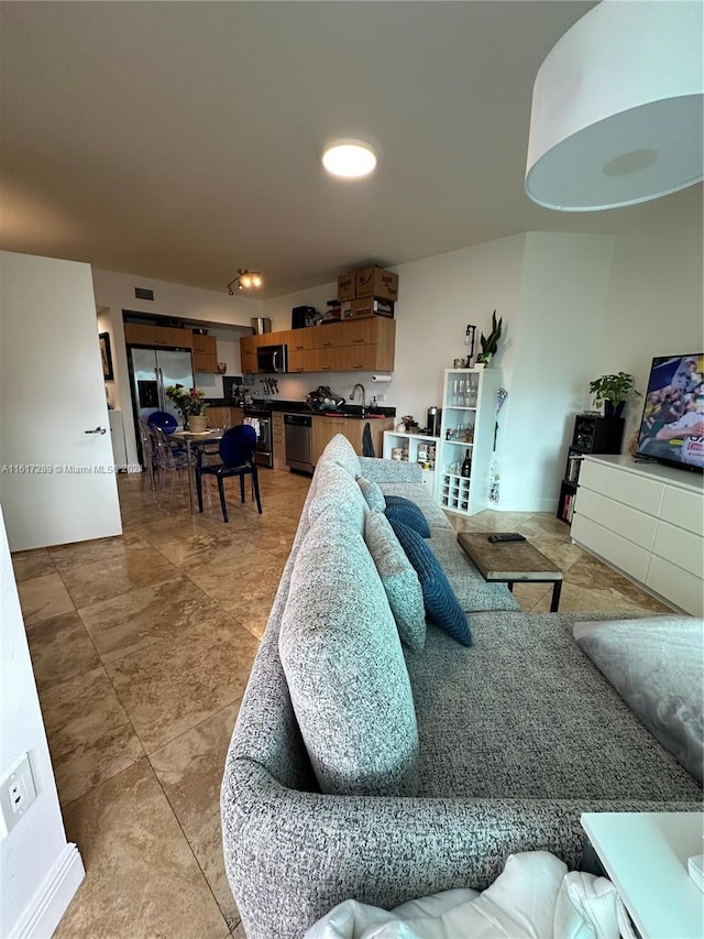 tiled living room with sink