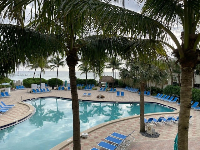 community pool featuring a patio area