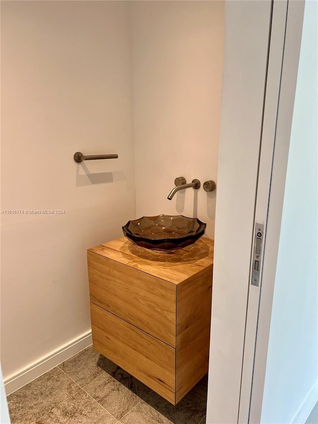 bathroom featuring vanity and tile patterned floors