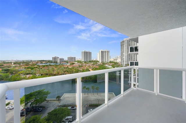 balcony featuring a water view