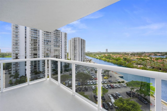 balcony featuring a water view