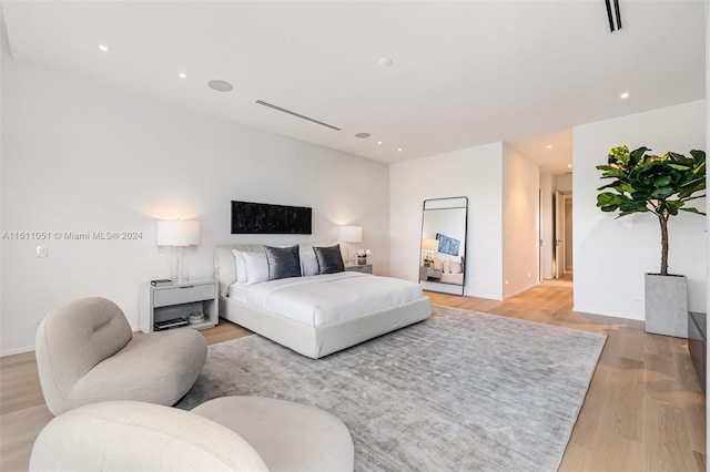 bedroom featuring light wood-type flooring