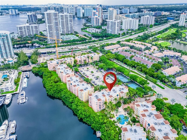 birds eye view of property featuring a water view