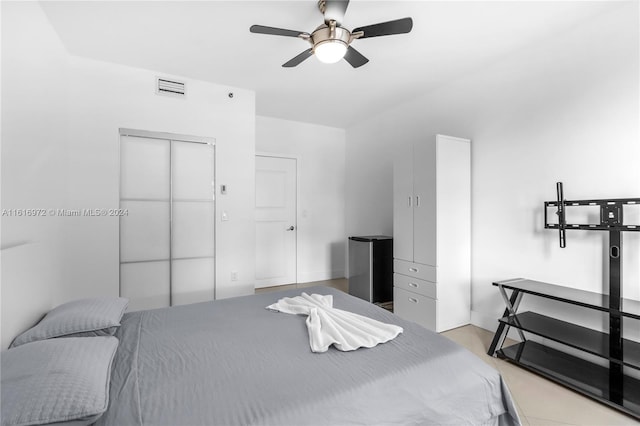 bedroom featuring a closet and ceiling fan