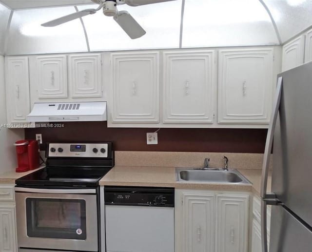 kitchen with white cabinets, appliances with stainless steel finishes, sink, and ceiling fan