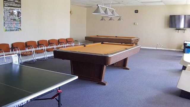 game room featuring pool table, dark carpet, and a paneled ceiling