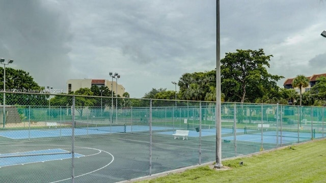 view of sport court with tennis court