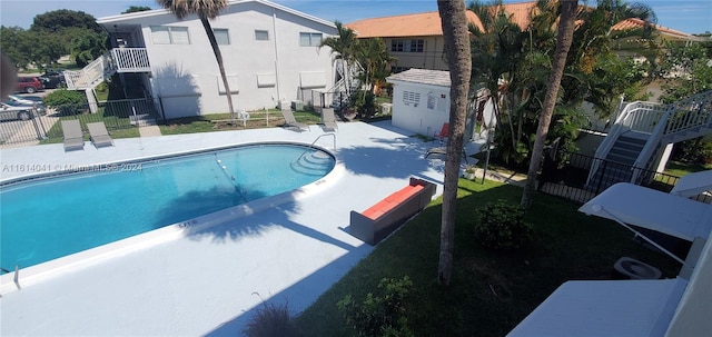 view of pool featuring a patio