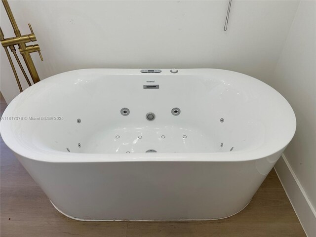 708 SE 3rd Ave Unit 201, Hallandale Beach, FL 33009 - interior details with a tub with jets